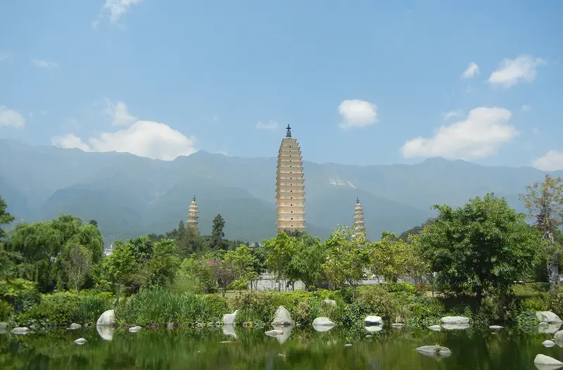 Three Pagodas of Chongsheng Temple: three pagodas rising above trees and water