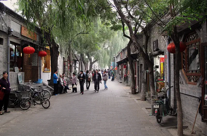 Nanluoguxiang hutong alley Beijing grey brick courtyard houses with courtyard shopfronts