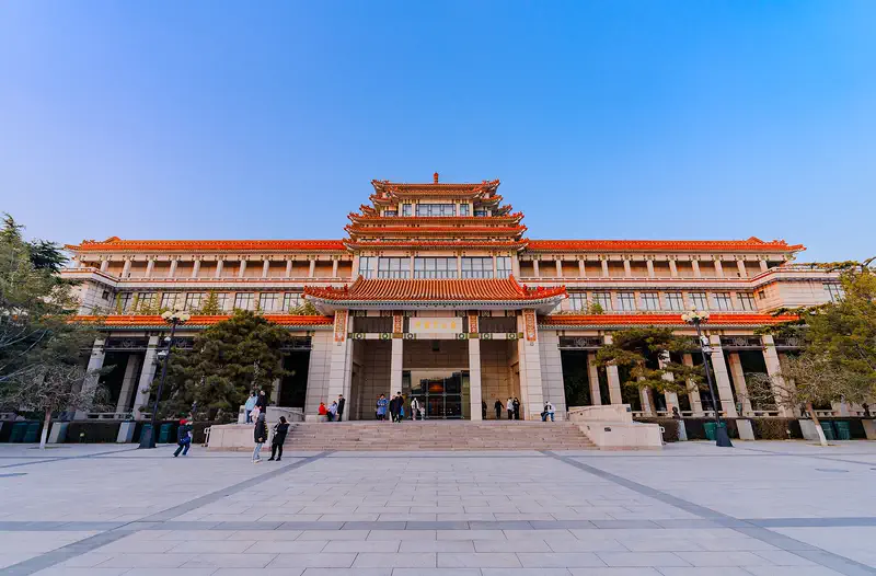 National Art Museum of China: the museum's tiered, yellow-tiled facade across an open forecourt