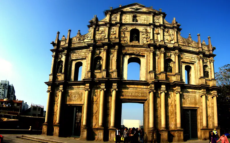 Ruins of St Paul baroque stone facade and stairway on Macau hilltop