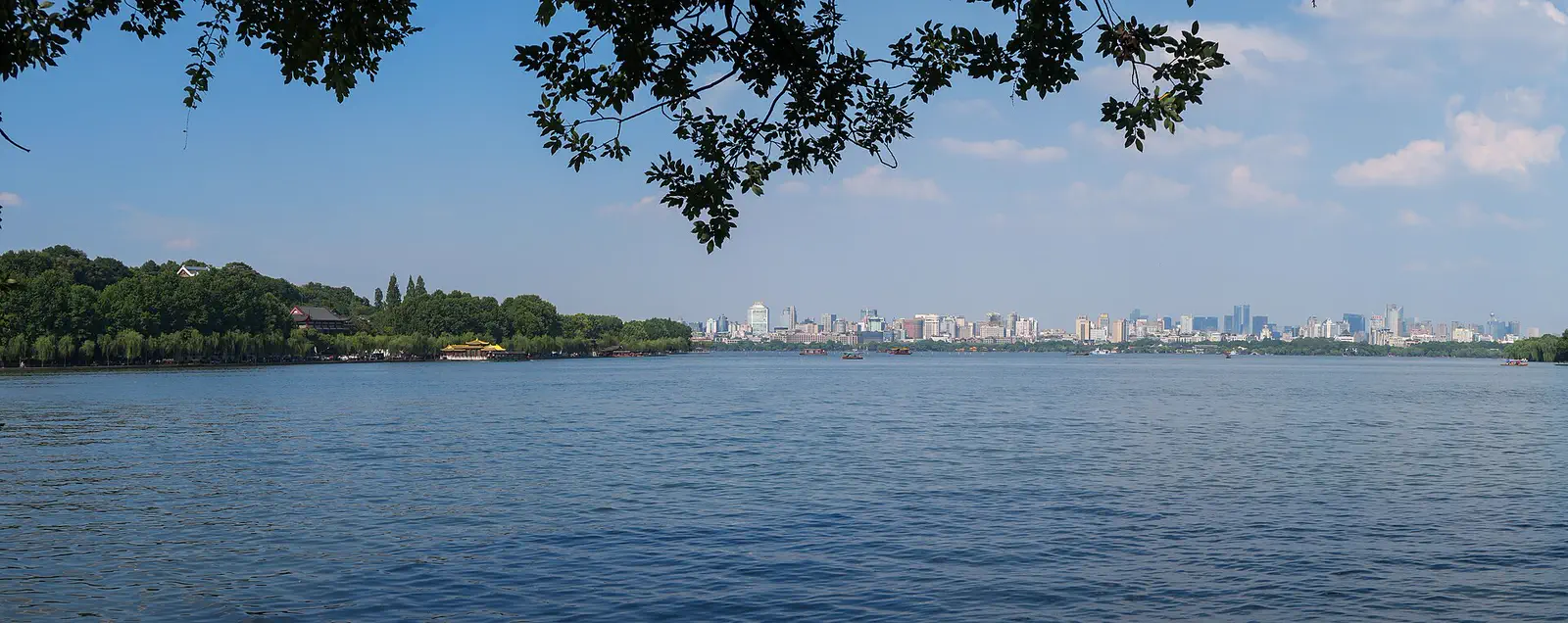 West Lake: the lake with the Hangzhou skyline low on the far shore