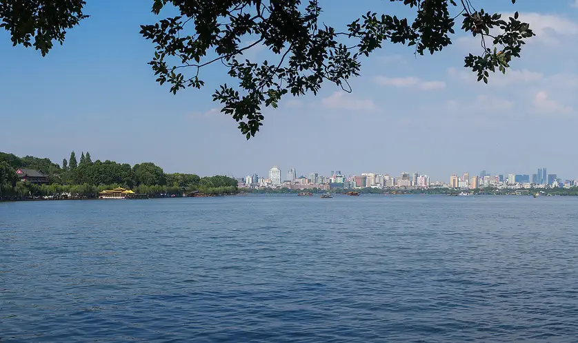 West Lake: the lake with the Hangzhou skyline low on the far shore