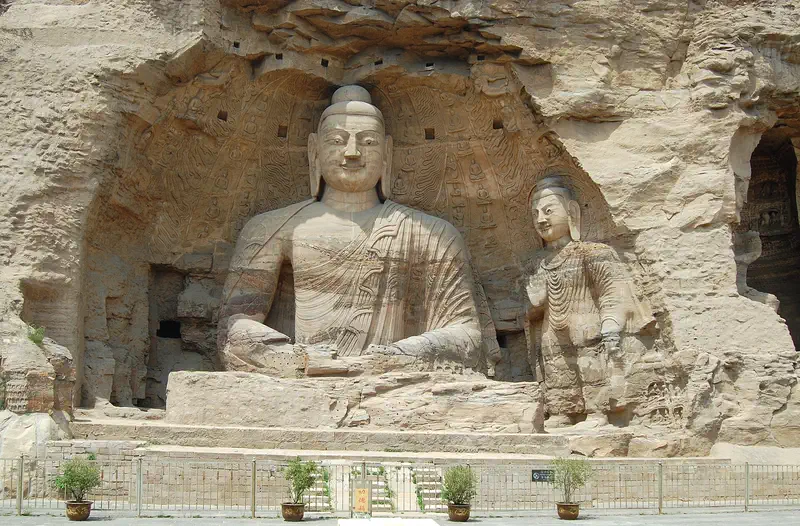 Datong: the seated Buddha carved into the cliff at the Yungang Grottoes