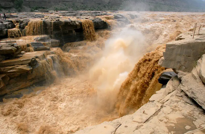 Linfen: the Yellow River pouring brown over the rock ledges of Hukou Waterfall