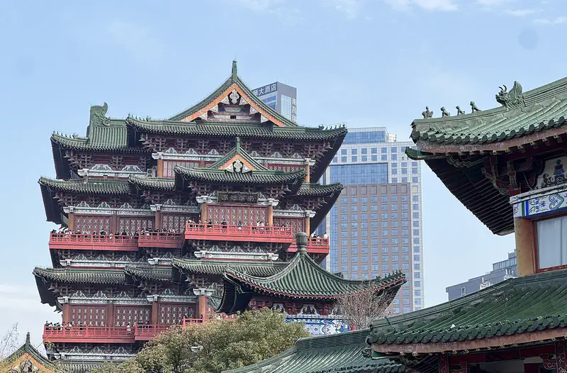 Nanchang: the multi-storey red and green Pavilion of Prince Teng with a modern tower behind