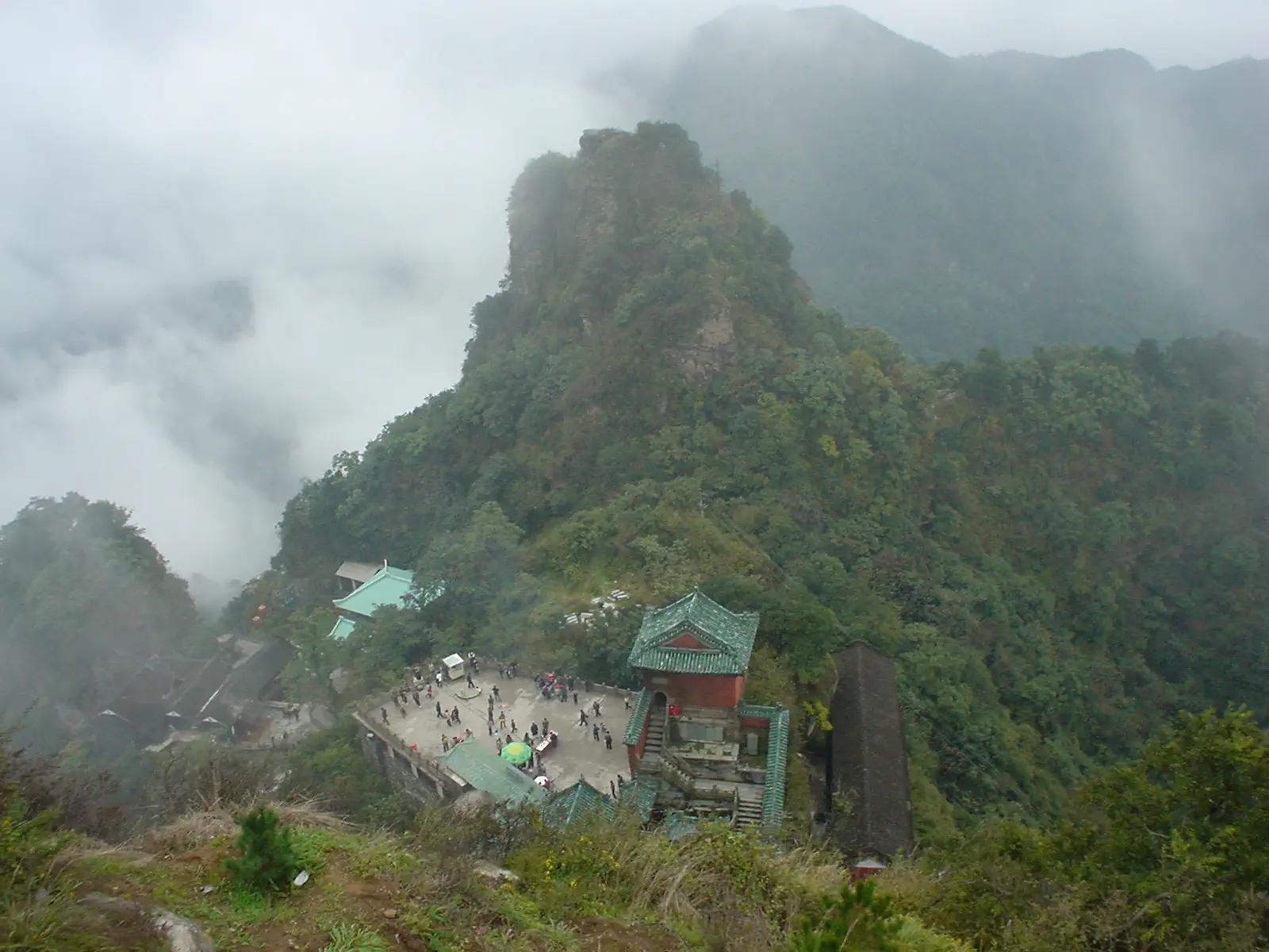 The gold-roofed summit temple of the Wudang Mountains rising through cloud, Hubei