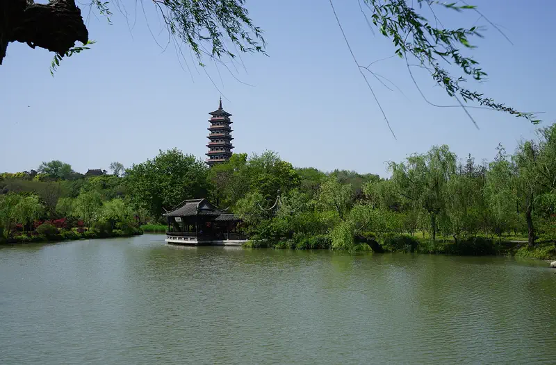 Yangzhou: a pagoda across the water at Slender West Lake, framed by willows